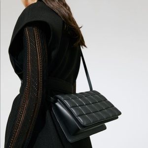 Shoulder bag with flap and iner compartment